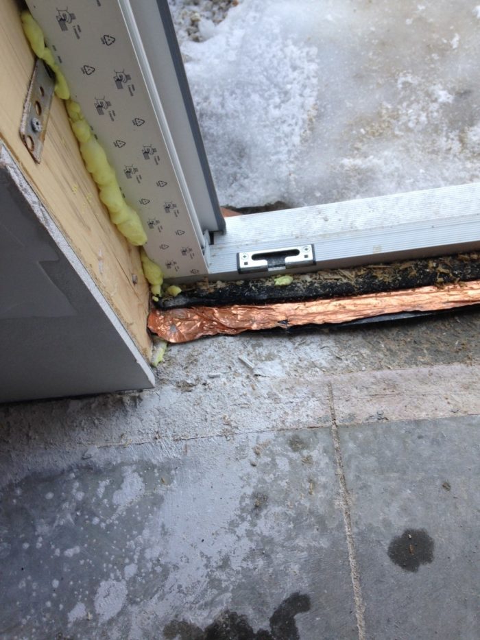 Sealing a door threshold GreenBuildingAdvisor