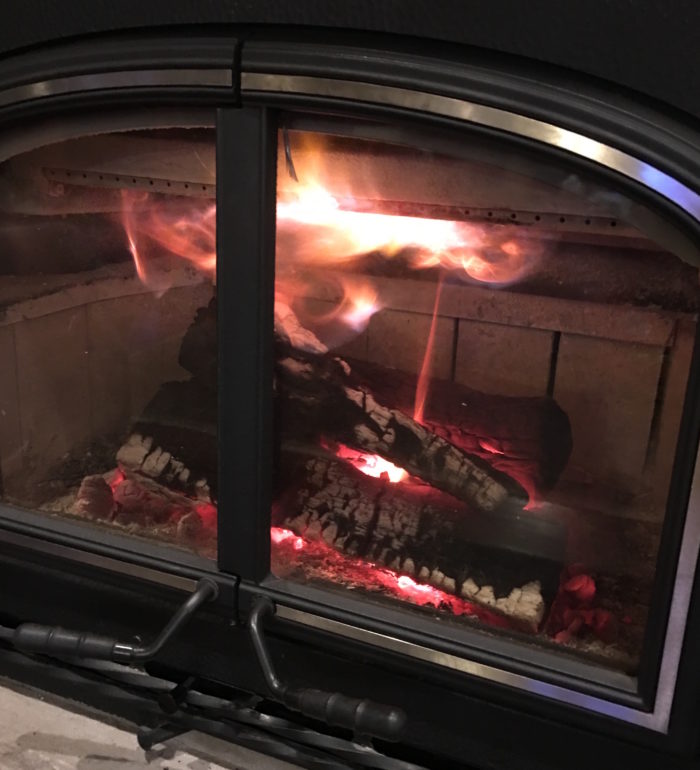 Need advice on air intake changes for backdrafting wood stove