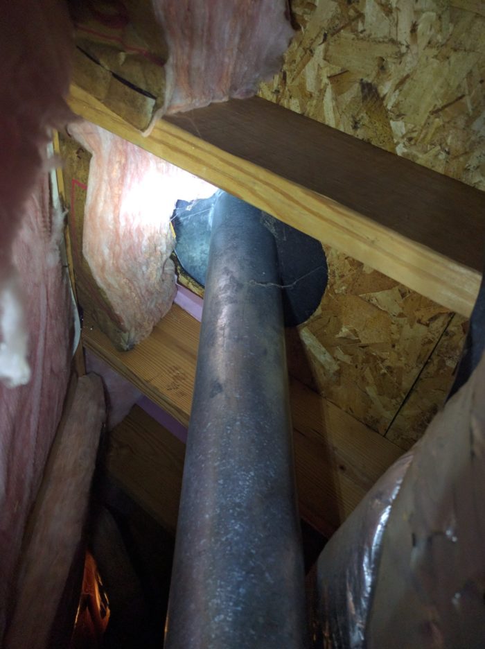 Opencell foam contacting a water heater flue GreenBuildingAdvisor