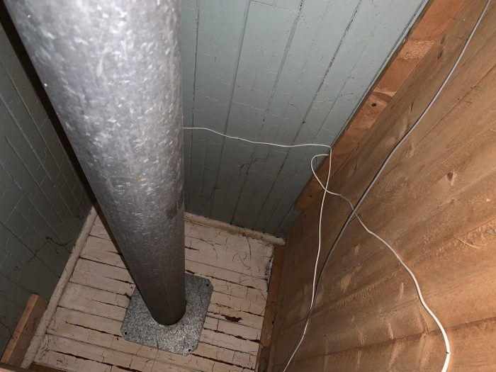 Insulation Around Gas Water Heater FlueUpdated Question with Photo