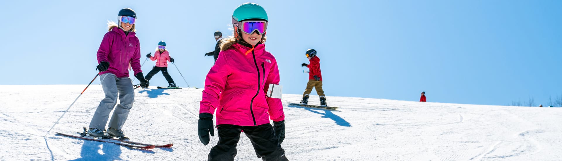 Girl Skiing at The Mountain Top