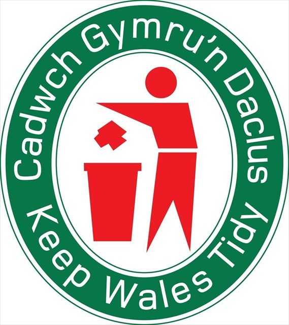 Keep Wales Tidy logo with person placing rubbish in a bin.