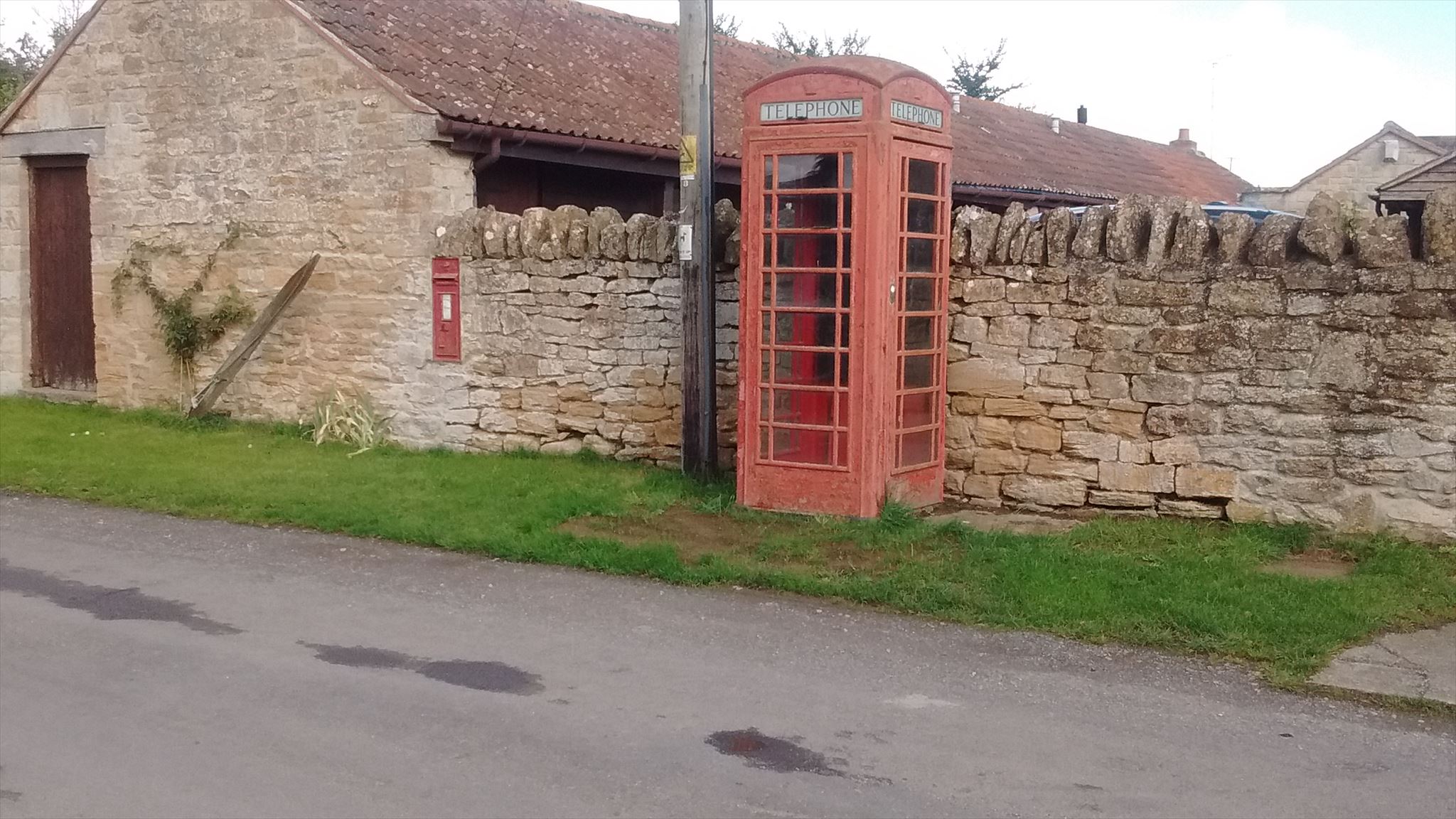 A picture of the phone box and post box