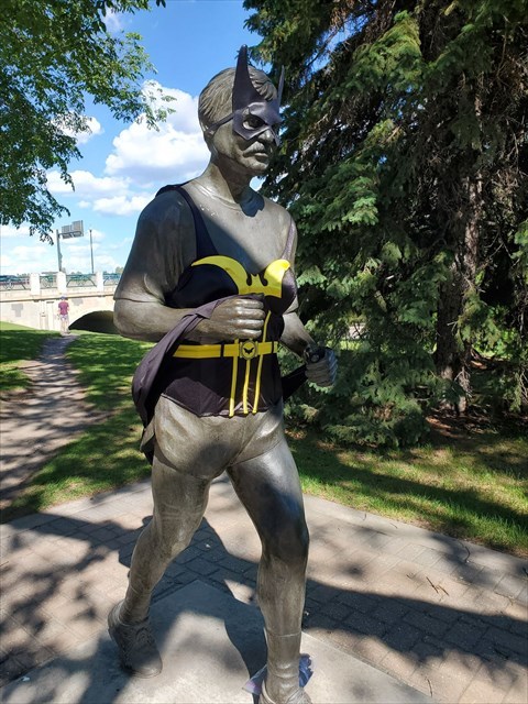 Denny Carr statue dressed as Batgirl