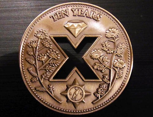 Tupperman Volunteer 10 Year Geocoin