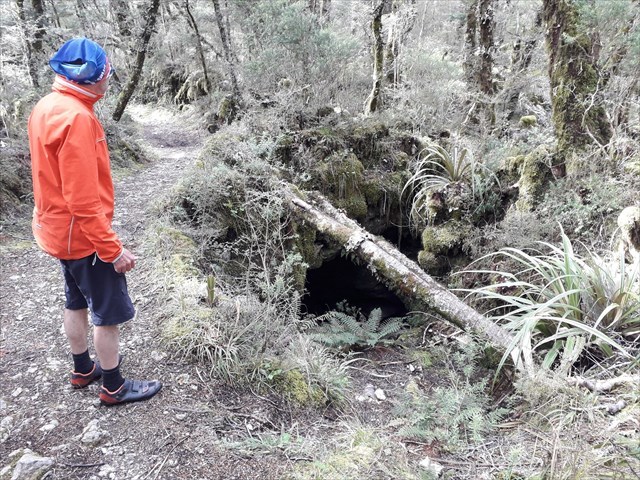 Go through Second Cave and back up to the track 