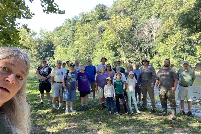 Event group photo by river