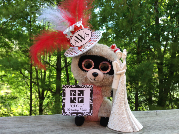 QT.Coon pictured here with our Wedding Cake Topper!