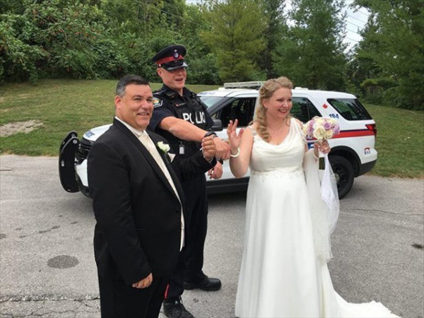 QT Coon Wedding Day Photo - Yikes! This happened on our Wedding Day! HINT: QT.Coons Wedding Cache is hiding just behind us! (Authorized permission for public release by YRP)