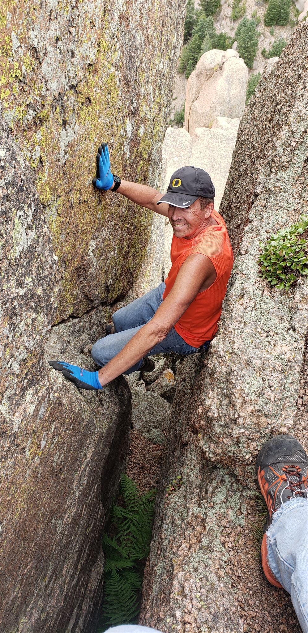 David climbing the "chimney" back up from the cache