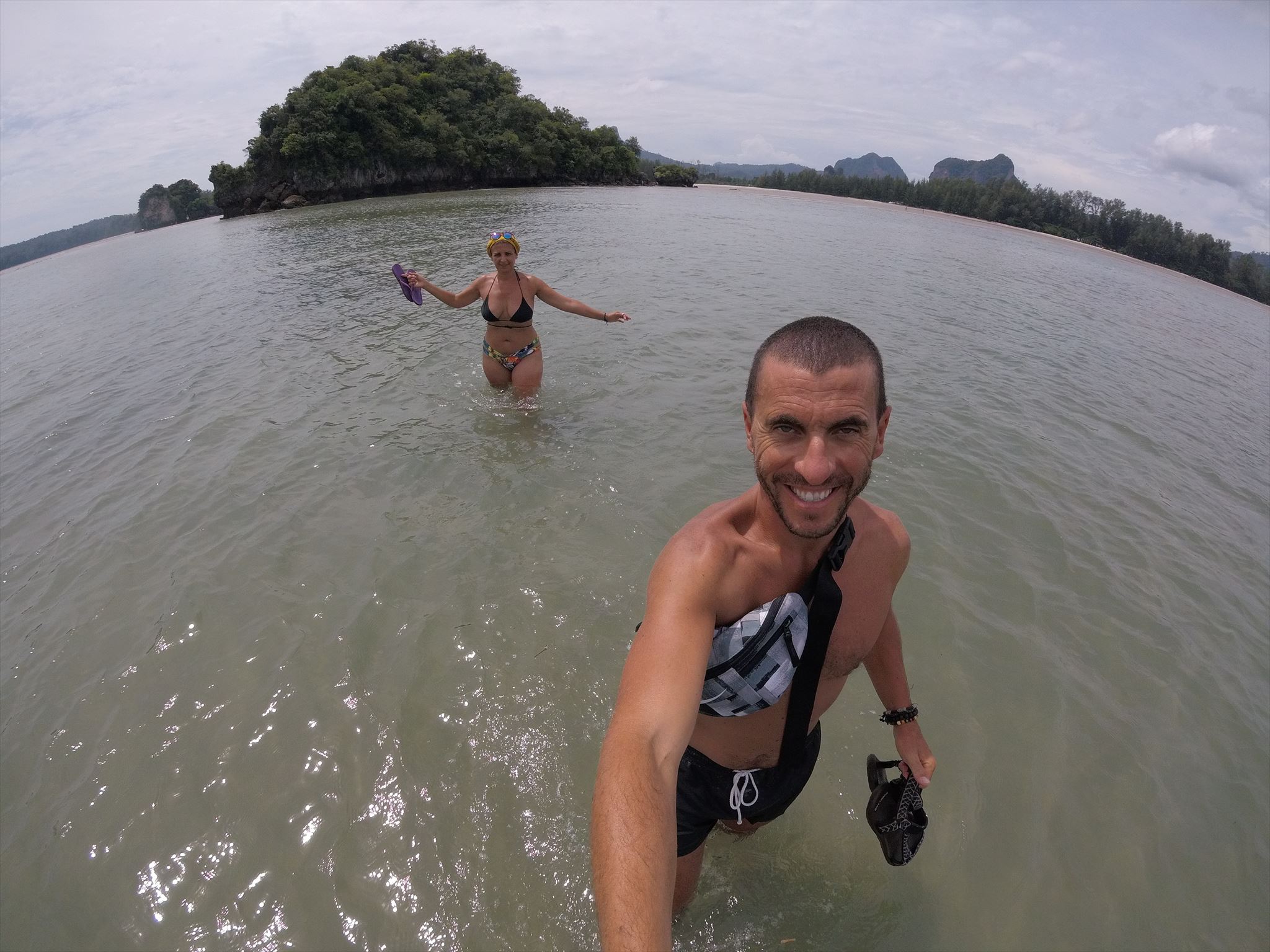Two strangers approaching the island