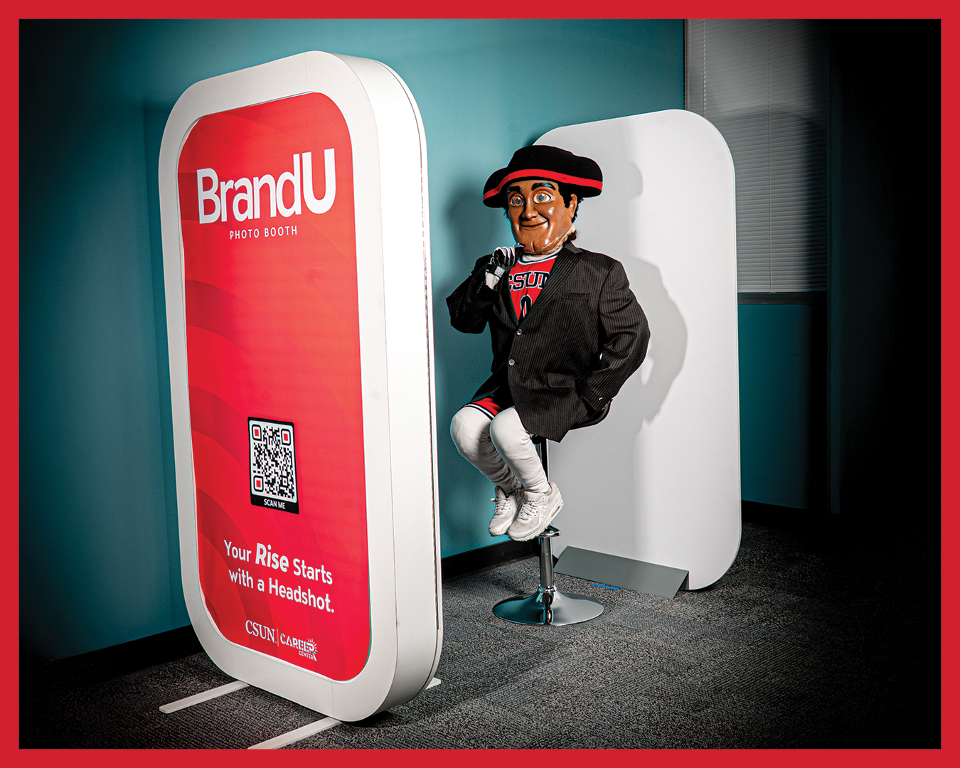 A group of students smiling in the career center. 