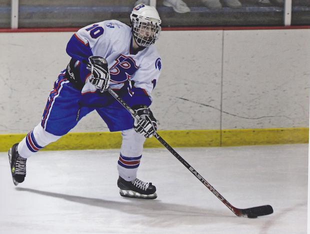Trent playing hockey