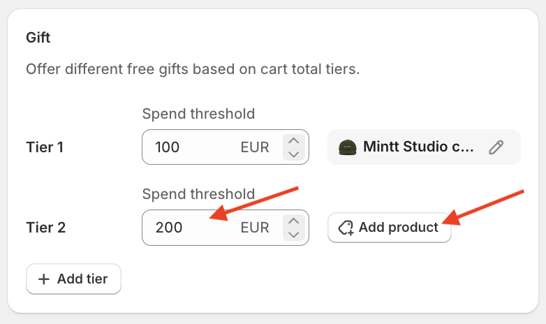 2 red arrows pointing to Tier 2 spend threshold and