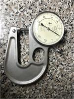 Hand held analog micrometer with 0.0001 precision.  