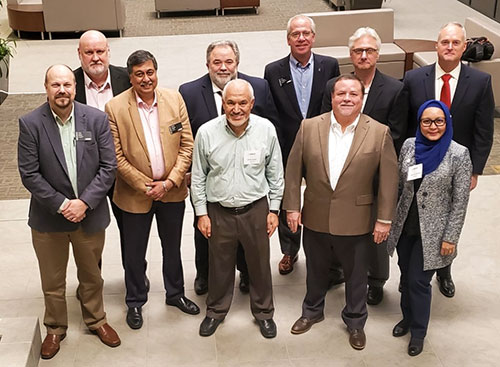 First row starting on the left: Tim Bieri, Samir Degan, Klefa Esaklul, Steve Biagiotti, Nurul Mohamed  Second row starting on the left: David Barnes, Roy Fultineer, Chris Conner, Hank Kleinfelder, Robert Herron Not pictured: Elise Owen