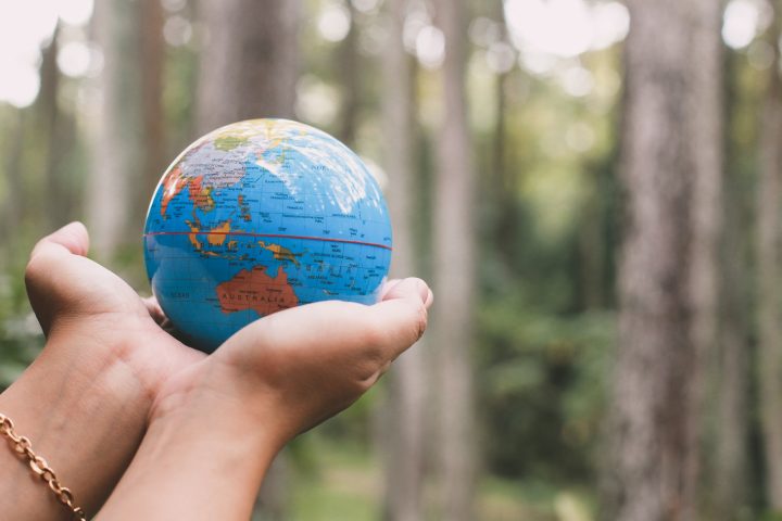 Hand Holding Earth Globe for Earth Day Concept