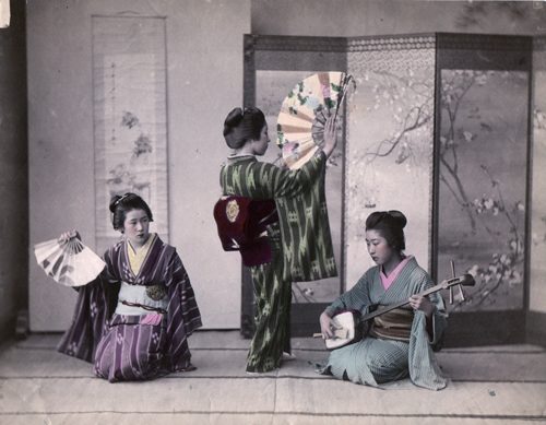 Two Ladies Dancing and One Playing a Samisen