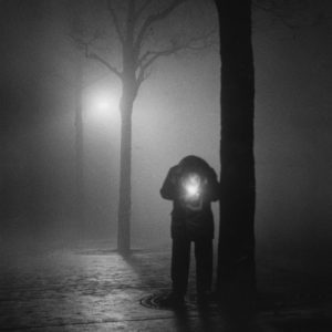 Homme de Nuit Illumant sa Cigarette, Paris