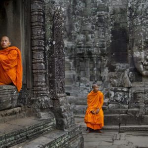 Monks Resting at Bayon Temple Angkor, Cambodia