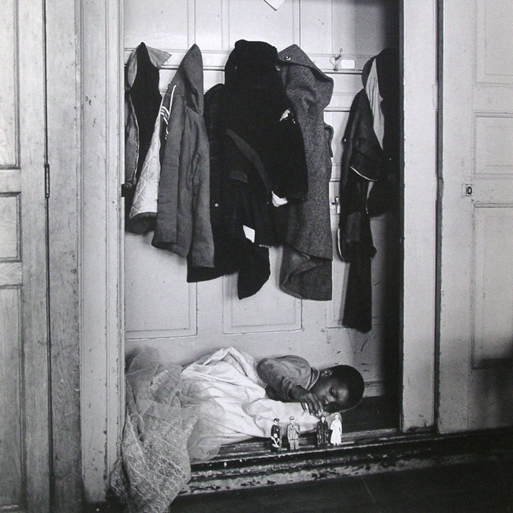Howard Sochureck, A Child Sleeps on Closet Floor, Manhattan, New York