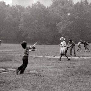 Brian Hamill, Woody Allen, child actor Damion Scheller, and actress Mariel Hemingway play softball in a scene from their film 'Manhattan,' New York