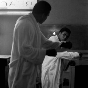 Brian Hamill, Muhammad Ali watches his reflection in a mirror during training at the 5th Street Gym, Miami, Florida photograph for sale