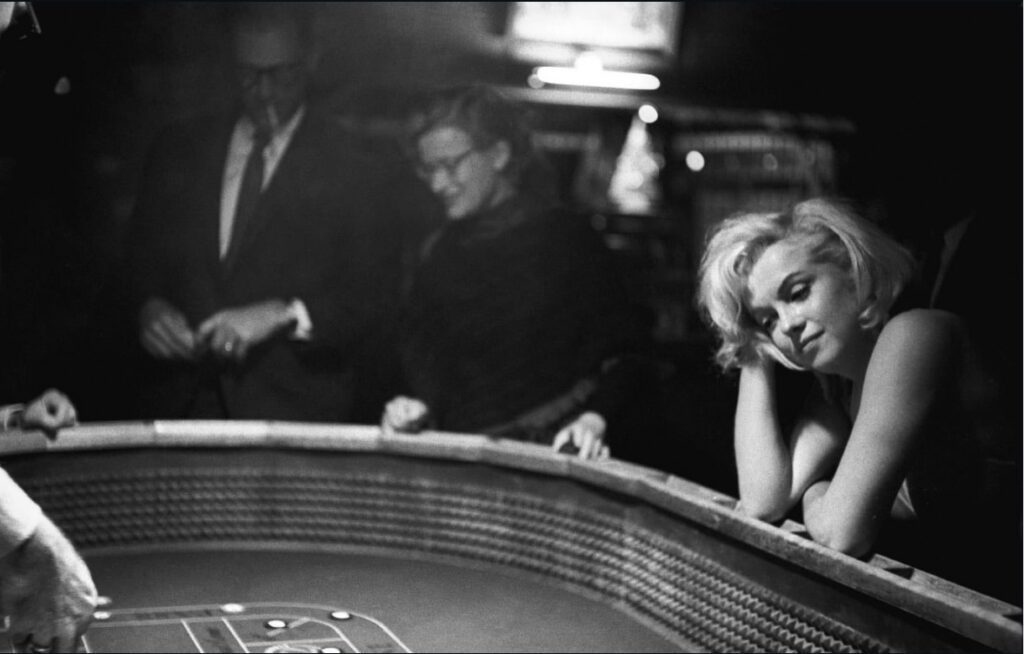 Marilyn Monroe Gambling With John Huston During Production of ‘The Misfits