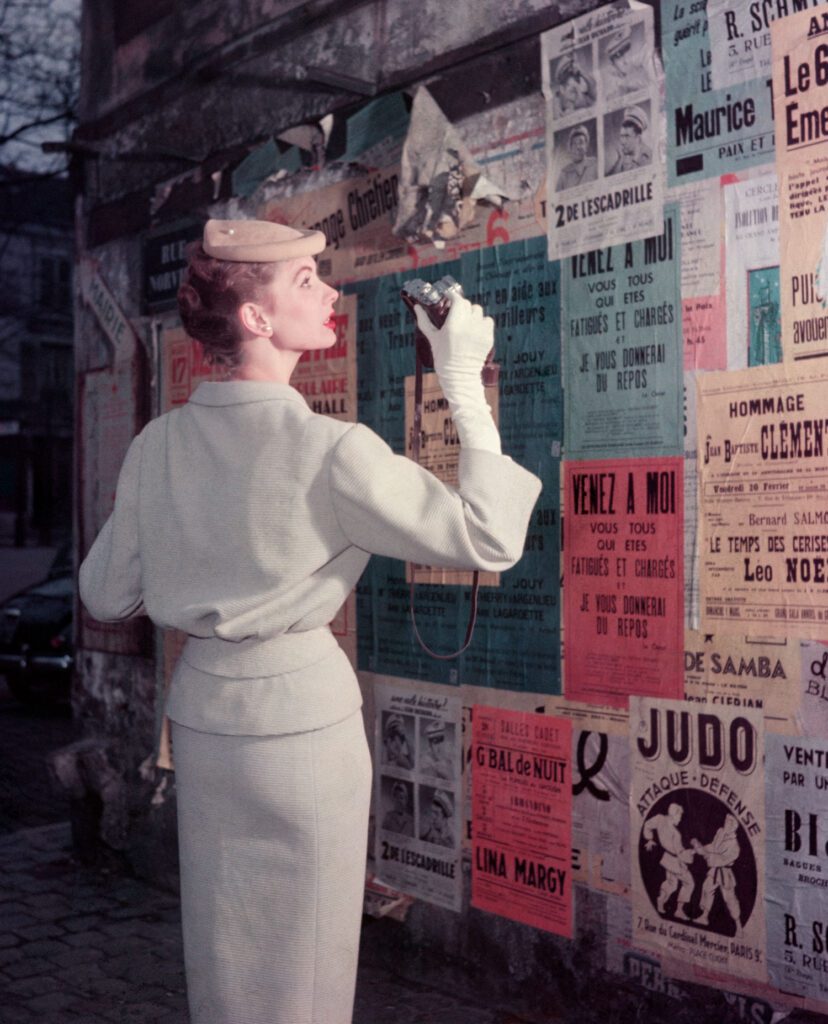 Georges Dambier, Suzy Parker Photographer with Posters, 1953, Archival pigment photograph