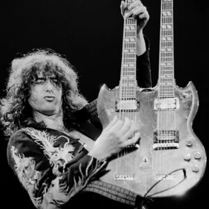 Terry O'Neill, Jimmy Page playing his double neck Gibson, 1975, Silver gelatin photograph