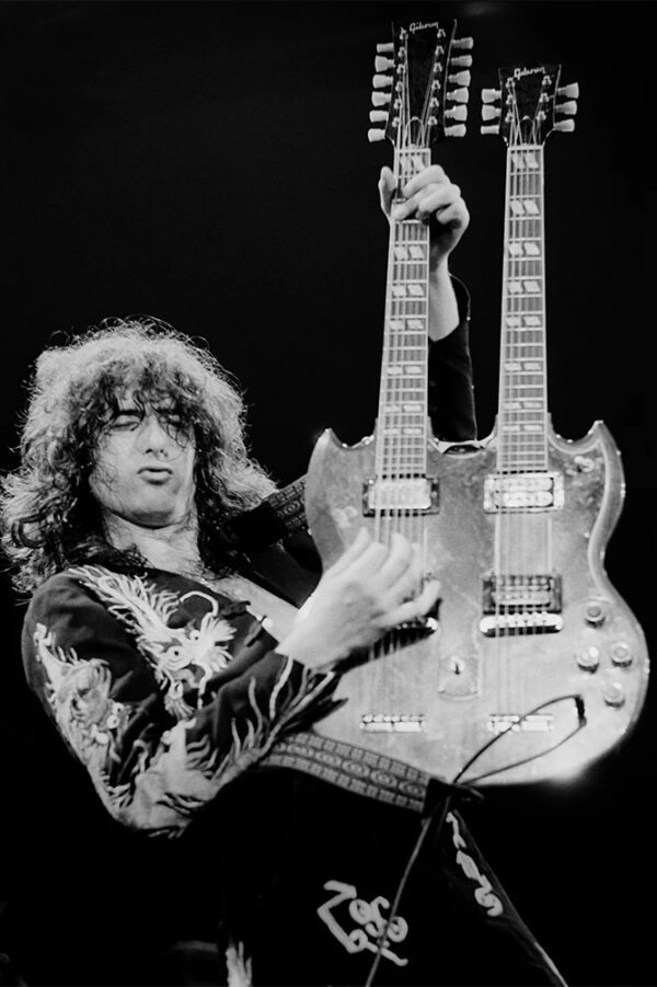 Terry O'Neill, Jimmy Page playing his double neck Gibson, 1975, Silver gelatin photograph