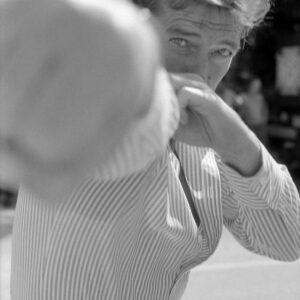 Terry O'Neill, Roger Moore, The Punch, 1975, Silver gelatin photograph