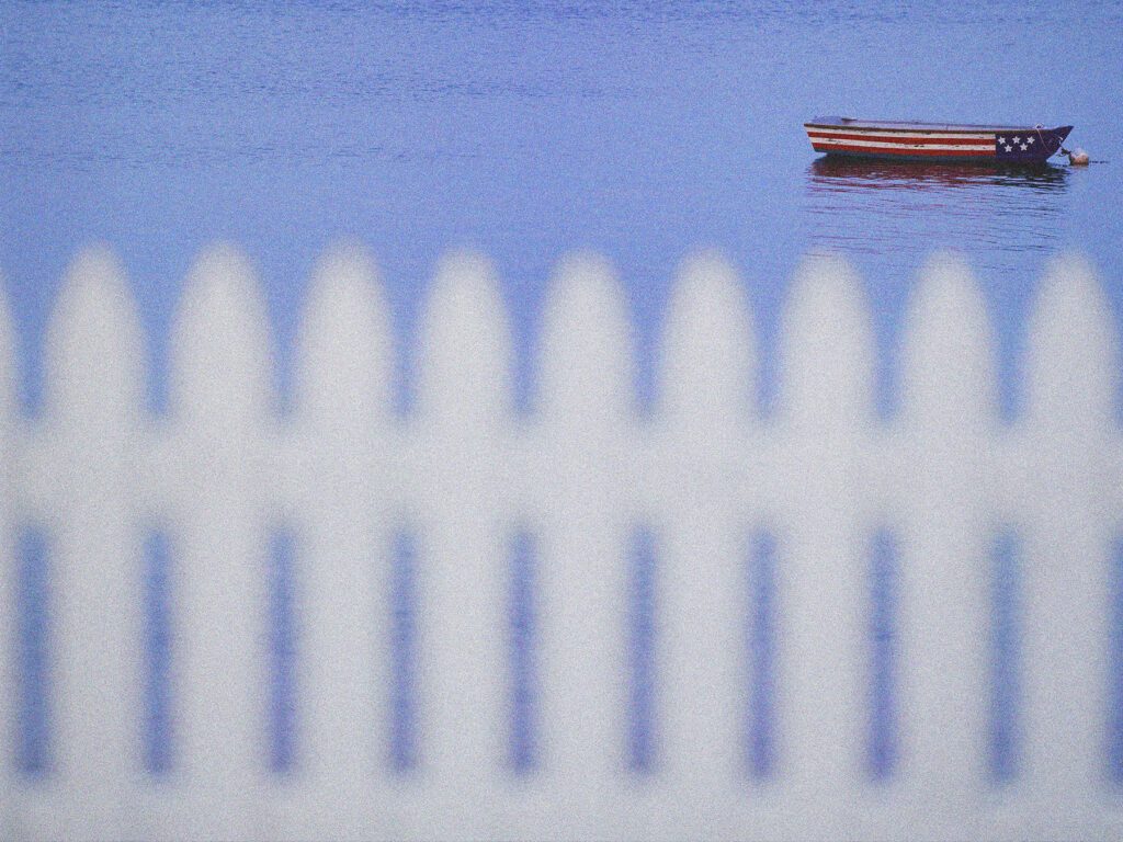 Stephen Wilkes, Flag Painted Rowboat and Fence,