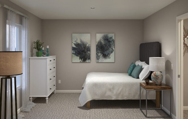 The guest bedroom in the Montgomery floorplan from the Inspire collection by Holiday Builders.