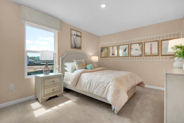 Bedroom in the Palmer floorplan, the model home in Ventura Manor in Milton, FL - a new home community by Holiday Builders.