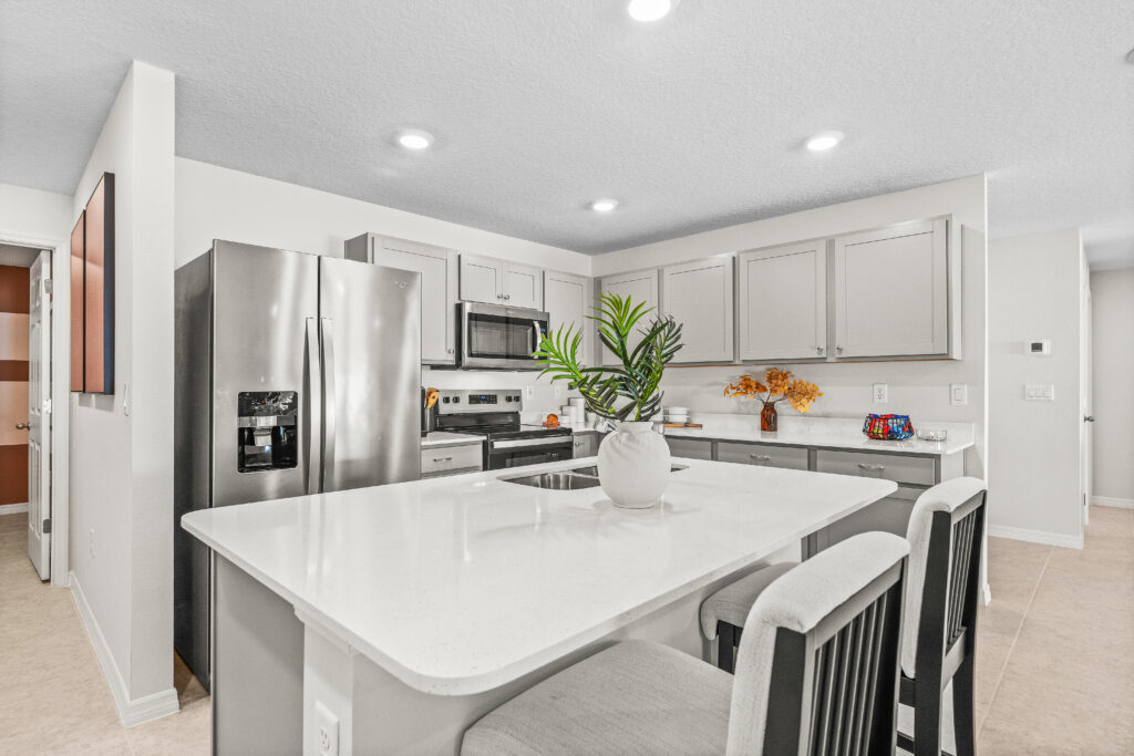 Upgraded White Quartz Countertops in the Majestic Kitchen from our Value Collection