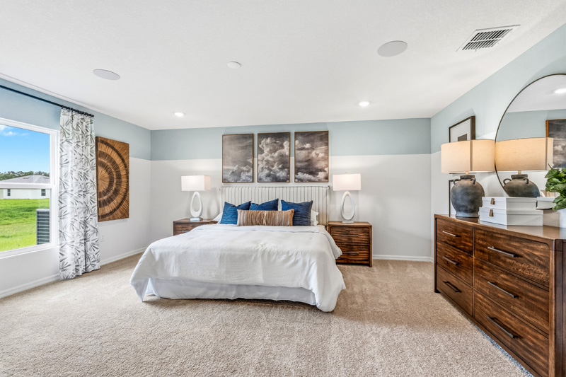 Tillman Oaks Wildwood, Florida Sales Center Primary Suite by Holiday Builders
