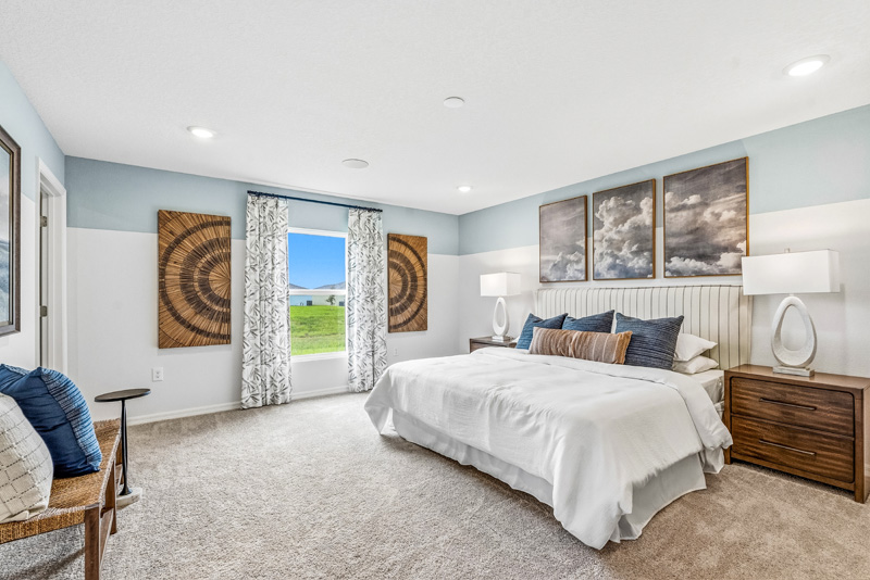 Tillman Oaks Wildwood, Florida Sales Center Primary Suite by Holiday Builders