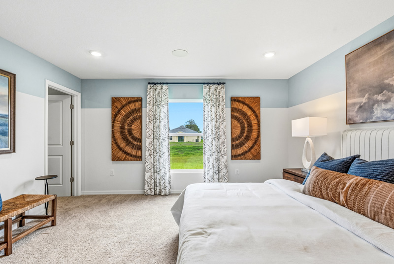 Tillman Oaks Wildwood, Florida Sales Center Primary Suite by Holiday Builders