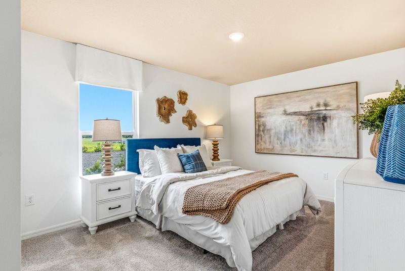 Tillman Oaks Wildwood, Florida Sales Center Guest Room by Holiday Builders