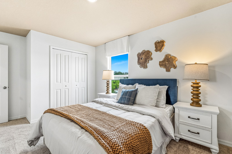 Tillman Oaks Wildwood, Florida Sales Center Guest Room by Holiday Builders