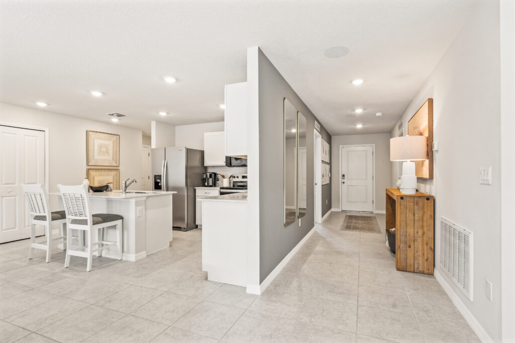 The Entryway and Kitchen in the Majestic floorplan from the Value Collection