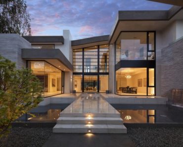 Curb view of magnifcent San Vincente House by McClean Designs