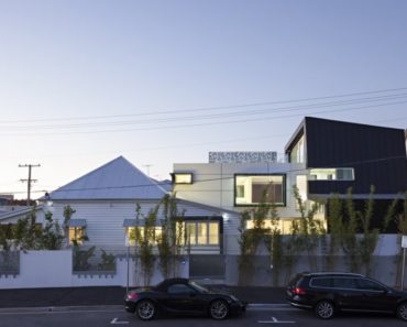 Modern addition to 19th century cottage by Base Architecture
