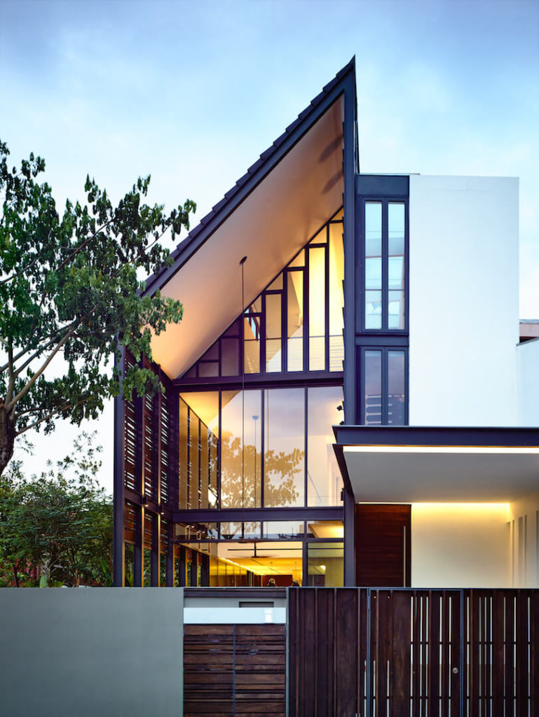 A close-up of the home's front exterior featuring the extensive windows in varying shapes. This home almost seems to be made up of mostly glass. A close-up of the home's front exterior featuring the extensive windows in varying shapes. This home almost seems to be made up of mostly glass.