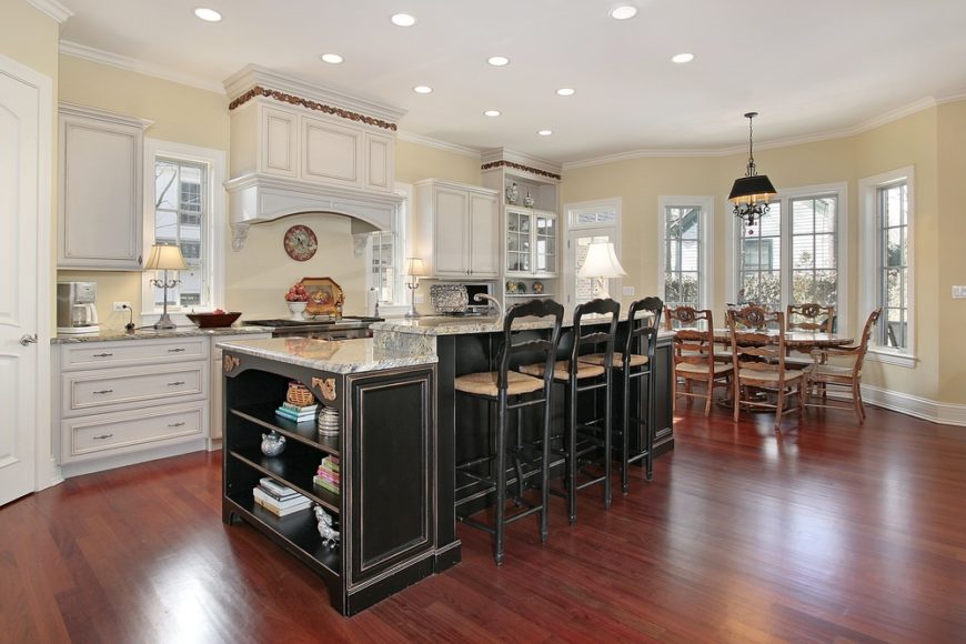 This elegant kitchen has beautiful colonial window panes that pair well with the classic design. Take note how the cabinet in the charming hoosier also houses colonial window panes for a harmonious arrangement. This elegant kitchen has beautiful colonial window panes that pair well with the classic design. Take note how the cabinet in the charming hoosier also houses colonial window panes for a harmonious arrangement.