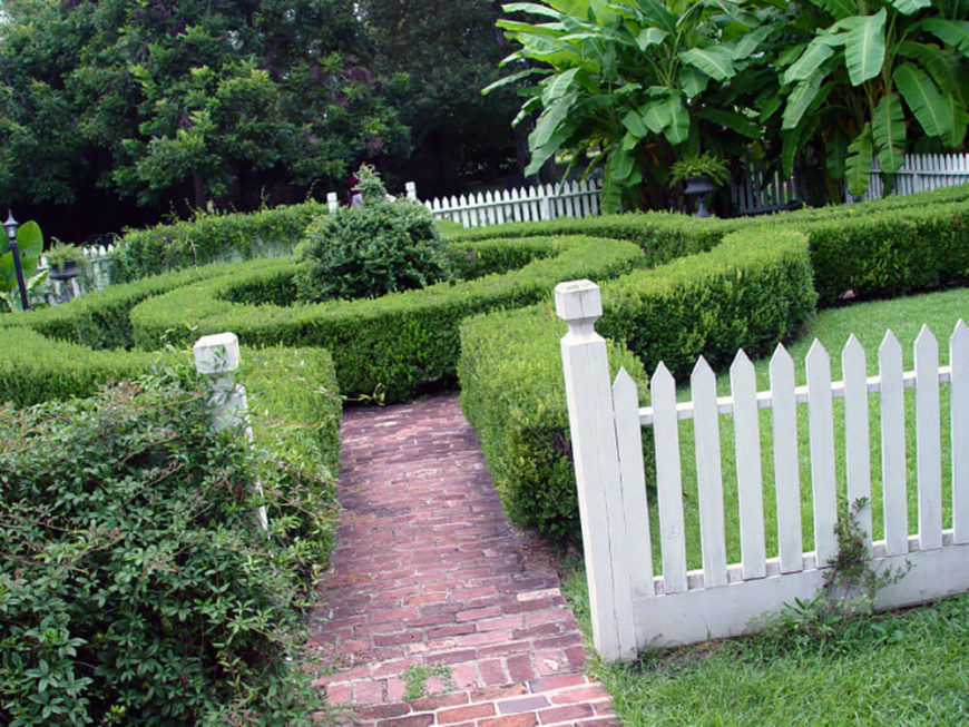 This beautiful space has a round hedge creating a small maze for multiple pathways. The hedges provide a beautiful walkway to three different destinations. This beautiful space has a round hedge creating a small maze for multiple pathways. The hedges provide a beautiful walkway to three different destinations.