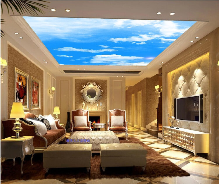 This living room has two different kinds of ottomans; a coffee table style ottoman and two more narrow bench-style ottomans. This living room has two different kinds of ottomans; a coffee table style ottoman and two more narrow bench-style ottomans.