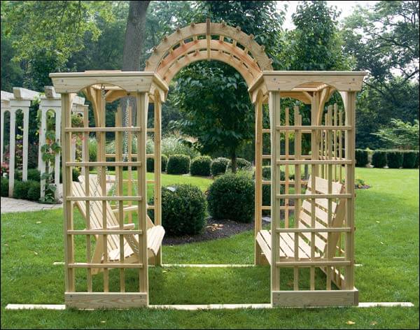 This freestanding arbor is wide and contains both a regular bench and a swinging bench. This is more of a solid structure, sort of a mix between a traditional arbor and a gazebo. This freestanding arbor is wide and contains both a regular bench and a swinging bench. This is more of a solid structure, sort of a mix between a traditional arbor and a gazebo.