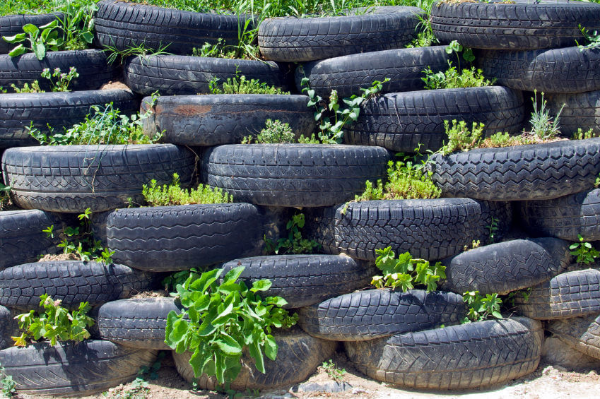 interesting pile of tires with what appears to be a series of small herb gardens - Garden Ideas Using Tyres interesting pile of tires with what appears to be a series of small herb gardens - Garden Ideas Using Tyres
